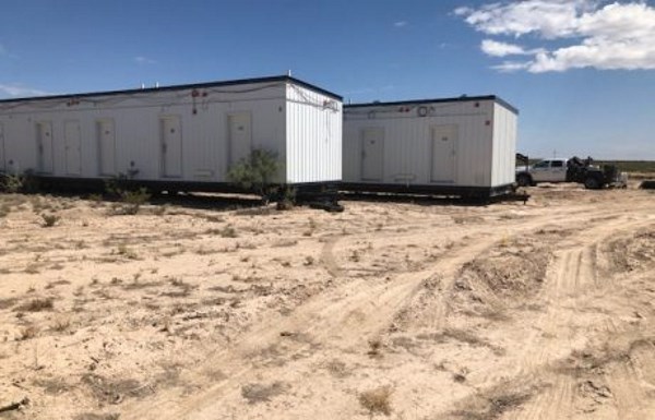 Two portable buildings for Aries for well site quarters