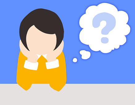 A computer-rendered image of a person with no facial features, a dark yellow shirt with a white collar and white cuffs in front of a blue background, and a thought cloud with a blue question mark hovering beside their head.