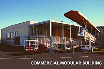A photograph of an off-white modular building with reflective orange construction poles around the building’s stairs and ramps under a beautiful blue-hued sky. There is a covered rollaway ramp parked next to the building. The phrase, “COMMERCIAL MODULAR BUILDING” is in white text on the bottom right.