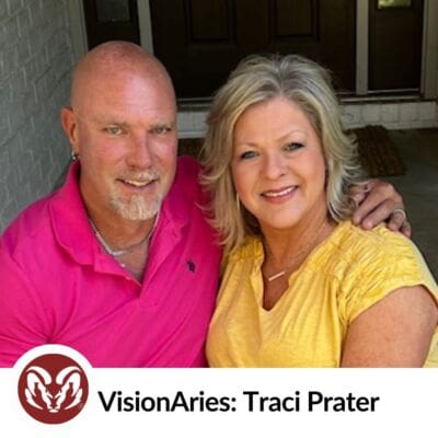 Photo of Traci Prater smiling with her husband. Text that reads "VisionAries: Traci Prater" next to the Aries logo.