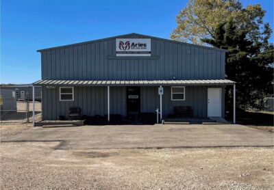 Aries gray office building in Cleburne, TX