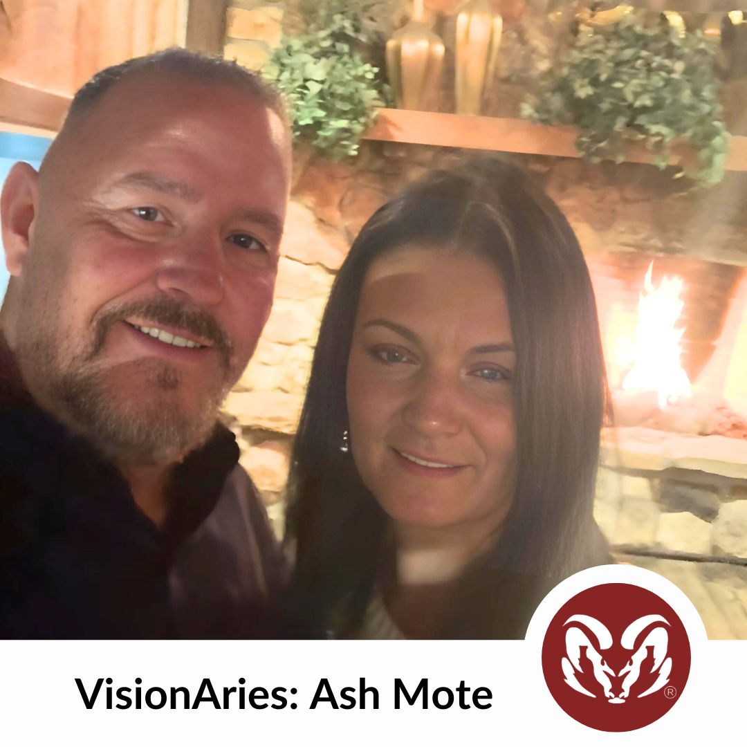 Photo of Ash Mote smiling with his wife. Text that reads "VisionAries: Ash Mote" next to the Aries logo.