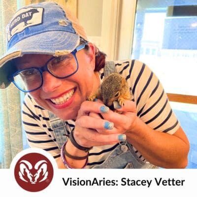 A photo of VisionAries nominee Stacey Vetter smiling holding a squirrel.