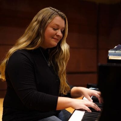A photo of one of Stacey Vetter's daughters playing the piano.