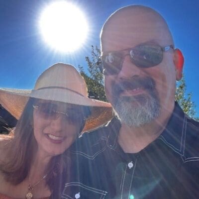 A photo of ABS VisionAries, Lani Baze, and her husband smiling for a selfie.