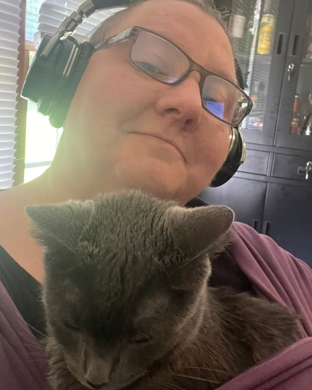 ABS VisionAries_Heather Irwin’s cat Pippa VisionAries Spotlight Heather Irwin's cat Pippa on her lap.