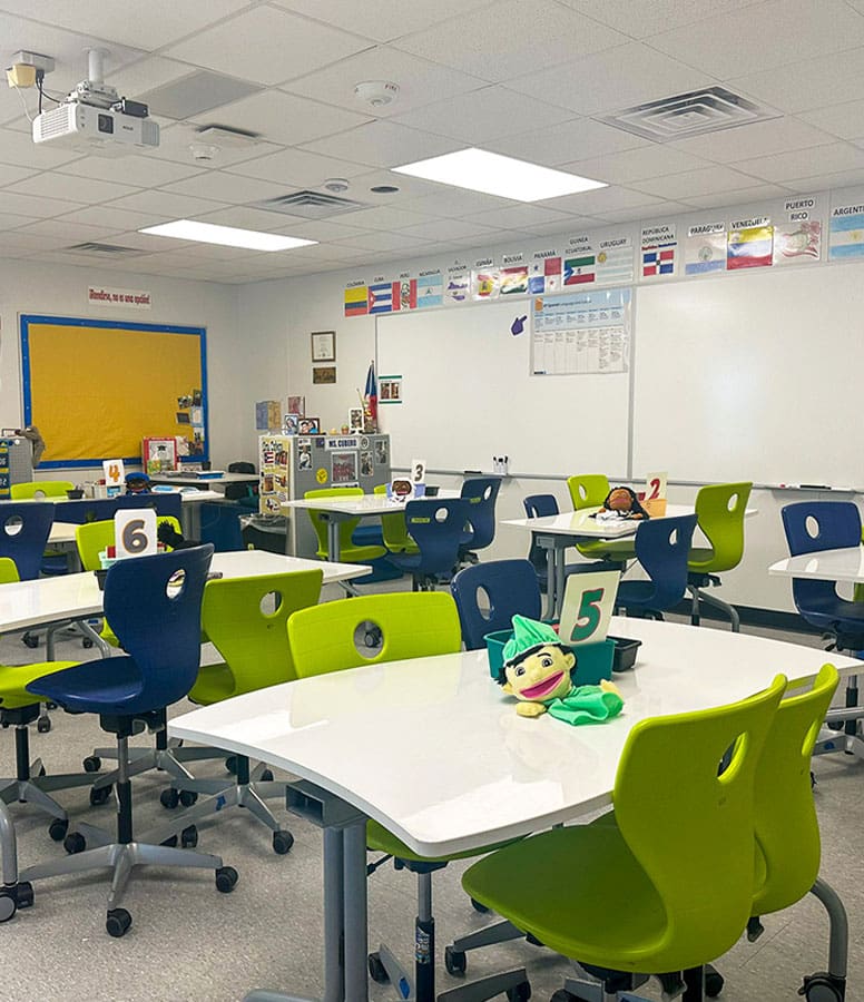 ADA-compliant portable classroom interior with colorful chairs, mobile desks, and accessible layout.