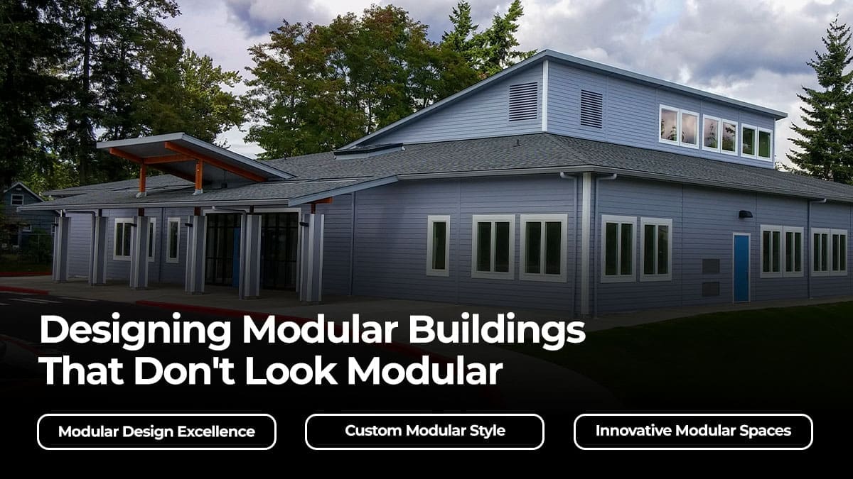 Modern custom building with a pitched roof and large windows, showcasing strategies for designing modular buildings that blend with traditional architecture.